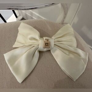Chanel Ivory Satin Bow Hair Accessory with Gold Perfume Detail Authentic